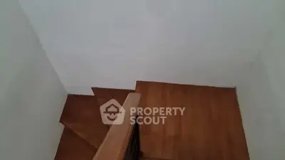 Wooden staircase with minimalist design in modern home