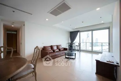 Spacious living room with modern furniture and stunning city view