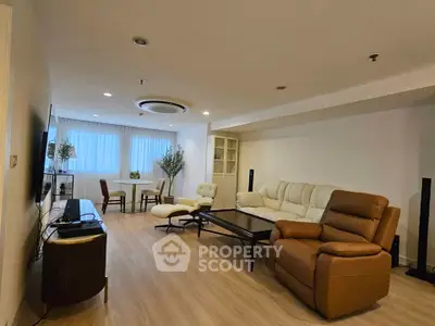 Spacious modern living room with elegant furniture and natural light