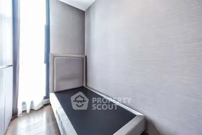 Minimalist bedroom with single bed and modern decor