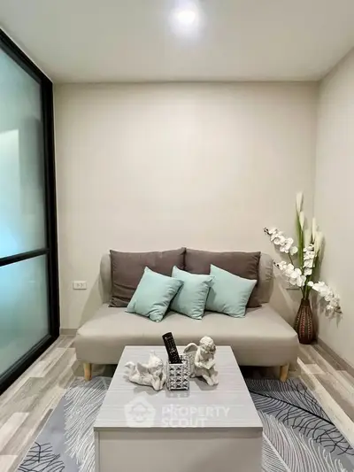 Cozy living room with modern decor and soft lighting, perfect for relaxation.