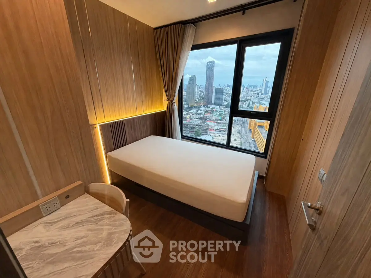 Modern bedroom with stunning city view and elegant wooden decor