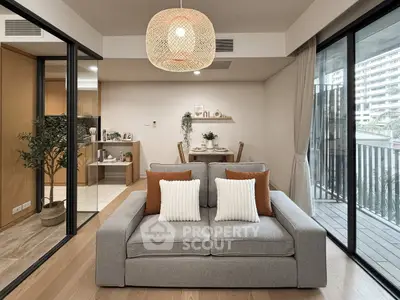 Modern living room with cozy sofa and balcony view in stylish apartment