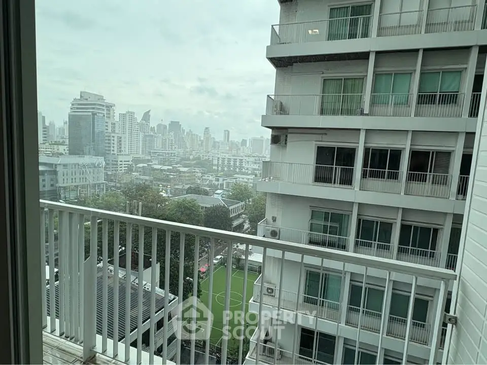 Stunning cityscape view from a modern apartment balcony, perfect for urban living enthusiasts.