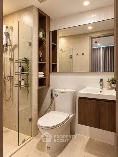 Modern bathroom with glass shower, sleek fixtures, and stylish wood accents.