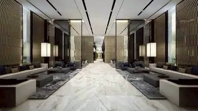 Luxurious modern lobby with elegant marble flooring and sophisticated seating areas.