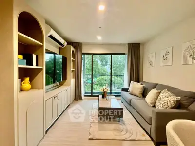 Modern living room with stylish decor and large window view