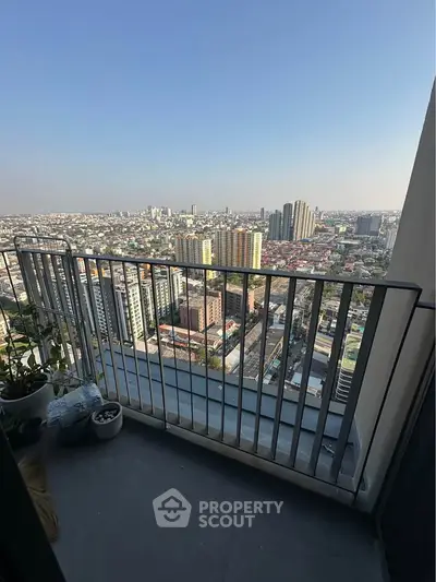 Stunning cityscape view from a high-rise balcony, perfect for urban living enthusiasts.