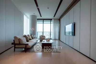 Luxurious modern living room with floor-to-ceiling windows and elegant decor