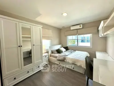 Cozy bedroom with modern furniture and natural light