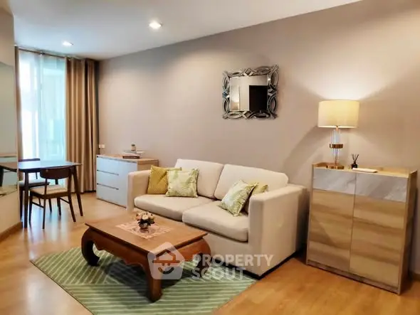 Modern living room with stylish decor, cozy sofa, and elegant lighting in a contemporary apartment.