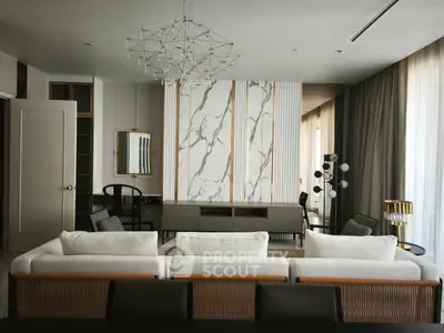 Luxurious modern living room with elegant marble accents and stylish furniture
