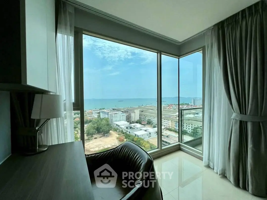 Stunning high-rise apartment with panoramic ocean view and modern interior design.