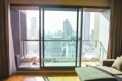 Luxurious apartment with stunning city view from spacious balcony, perfect for urban living.