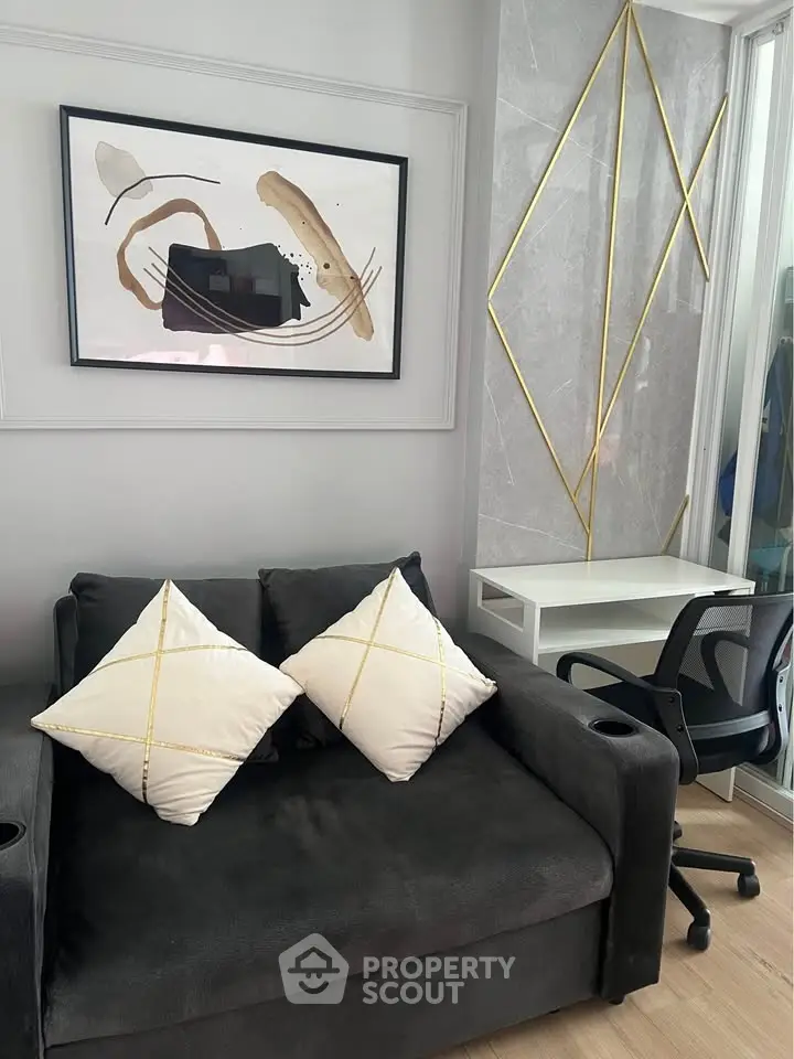 Modern living room with stylish decor and comfortable seating, perfect for relaxation and productivity.