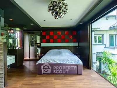 Luxurious modern bedroom with floor-to-ceiling windows and stylish decor