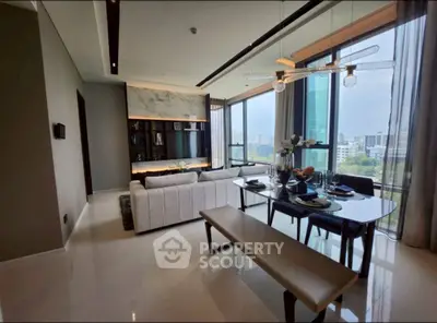 Luxurious modern living room with panoramic city views and elegant dining area.
