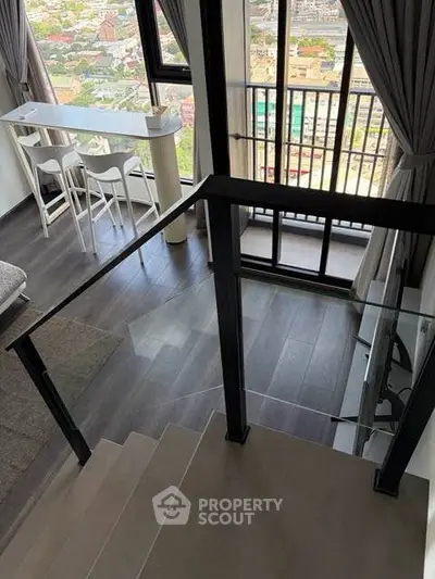 Modern duplex apartment with stunning city view and stylish interior design