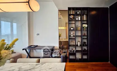 Elegant modern living room with marble table and stylish shelving unit