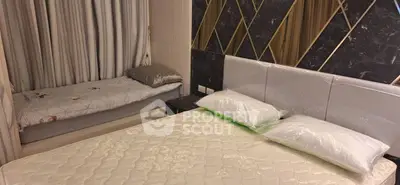 Luxurious bedroom with elegant decor and comfortable bedding