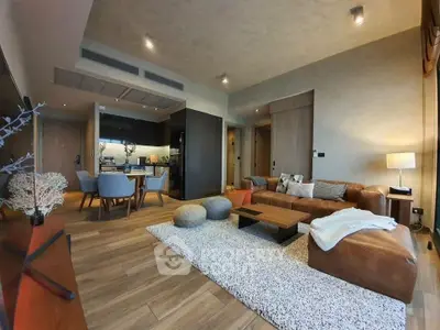 Spacious modern living room with open kitchen and stylish decor