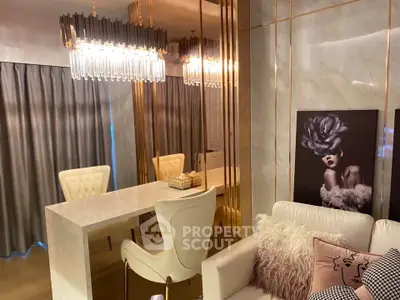 Luxurious modern living room with elegant chandelier and stylish decor