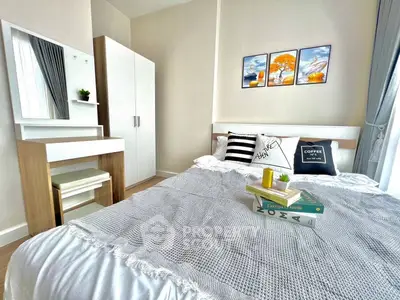 Modern bedroom with stylish decor and natural light