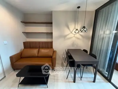 Modern living room with sleek furniture and stylish lighting in a contemporary apartment.