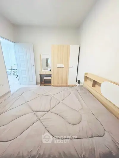 Cozy bedroom with modern wooden furniture and neutral decor
