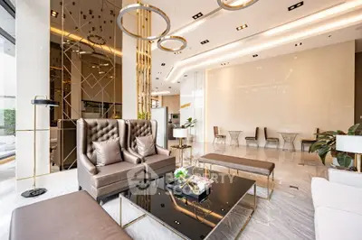 Luxurious modern living room with elegant decor and plush seating in a sophisticated setting.
