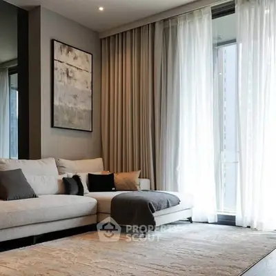 Luxurious living room with elegant sofa and floor-to-ceiling curtains