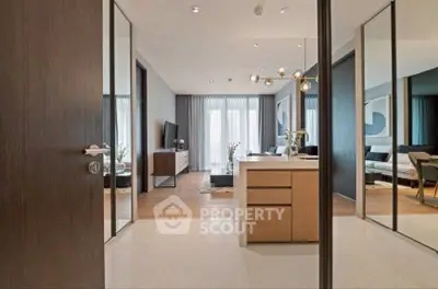 Modern open-plan living room with stylish decor and natural light