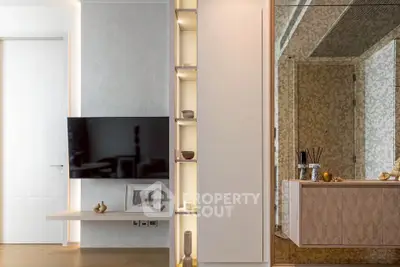 Modern living room with sleek TV setup and elegant decor