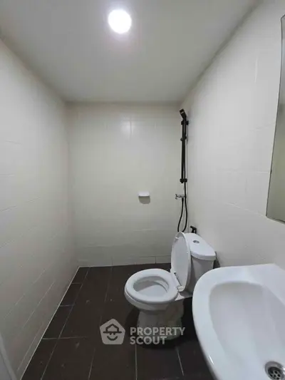 Minimalist bathroom with modern fixtures and sleek design