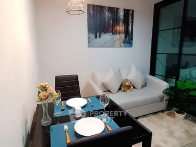 Cozy living room with elegant dining setup and modern decor