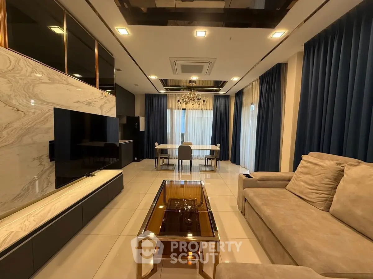 Luxurious modern living room with elegant decor and spacious seating area