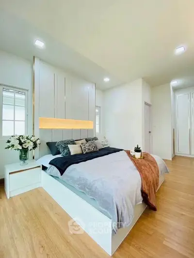 Luxurious modern bedroom with elegant decor and cozy ambiance