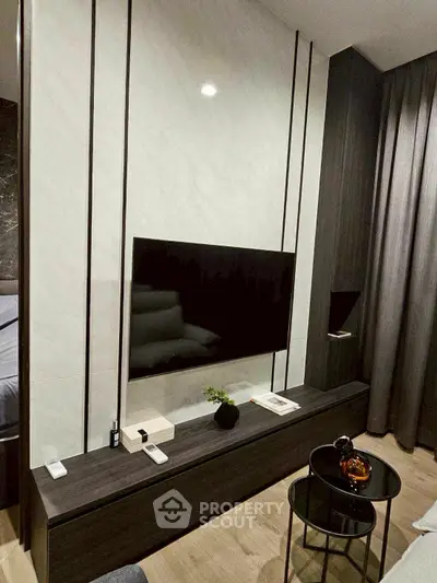 Modern living room with sleek TV setup and stylish decor