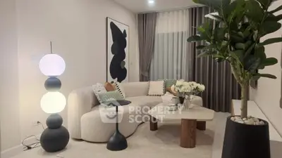 Modern living room with stylish decor and cozy seating area