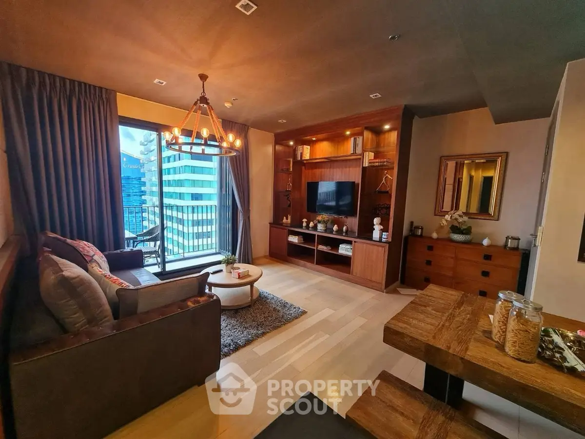 Luxurious living room with modern decor and city view balcony