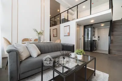 Modern duplex living room with stylish decor and mezzanine level