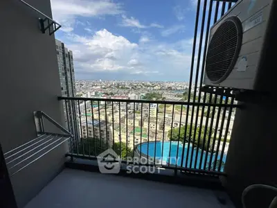 Stunning balcony view with cityscape and pool, perfect for urban living.