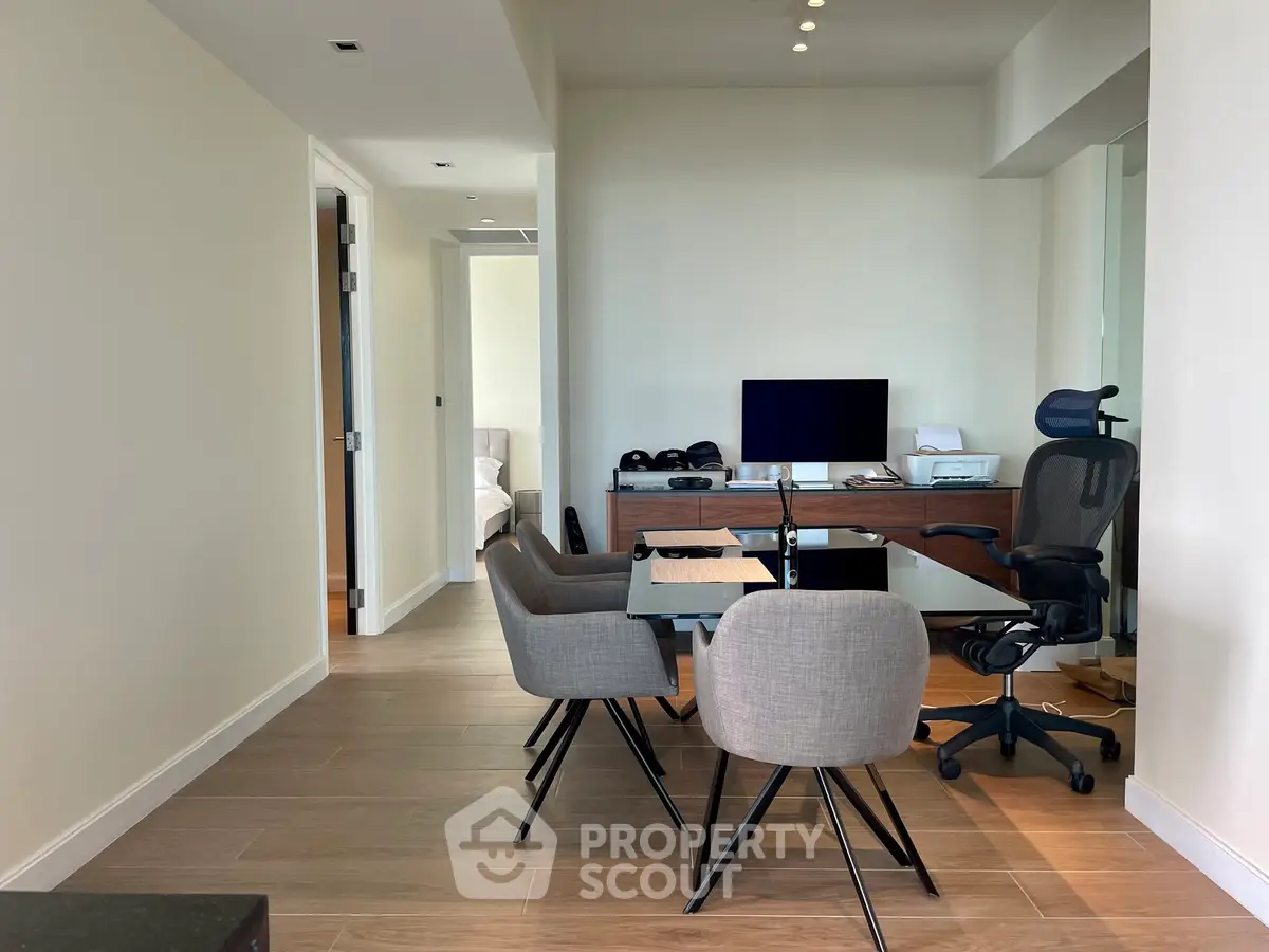 Modern home office with sleek furniture and natural light, perfect for productivity and comfort.
