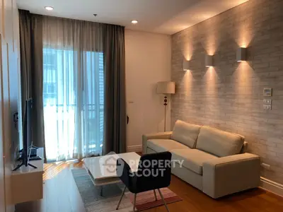 Modern living room with stylish lighting and cozy furniture