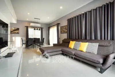 Modern living room with sleek furniture and stylish decor