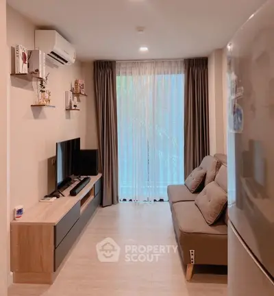 Modern living room with sleek furniture and natural light
