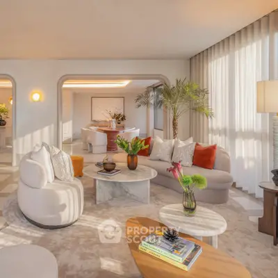 Luxurious living room with elegant decor and abundant natural light