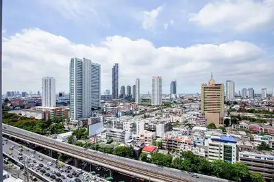 Stunning cityscape view showcasing modern skyscrapers and bustling urban life.