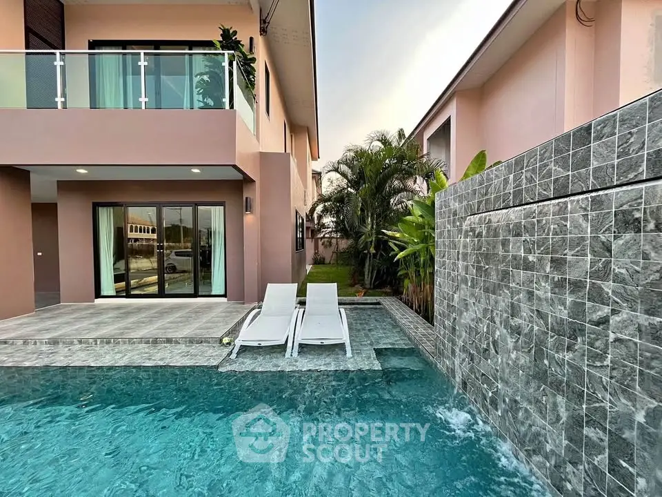 Luxurious modern home with private pool and stylish outdoor area, perfect for relaxation and entertainment.