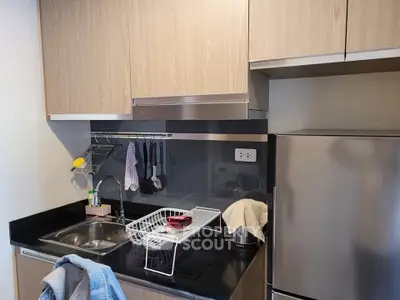 Modern kitchen with sleek cabinets and stainless steel appliances